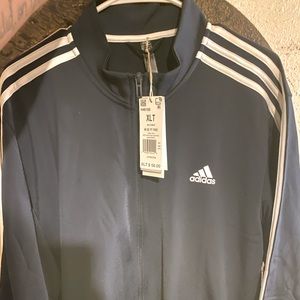 Blue Adidas Track suit that’s never been worn.